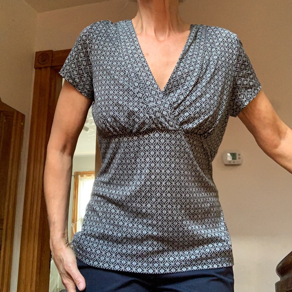 Empire waist capped sleeve blouse.